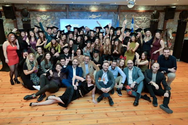 Students and instructors at a graduation ceremony